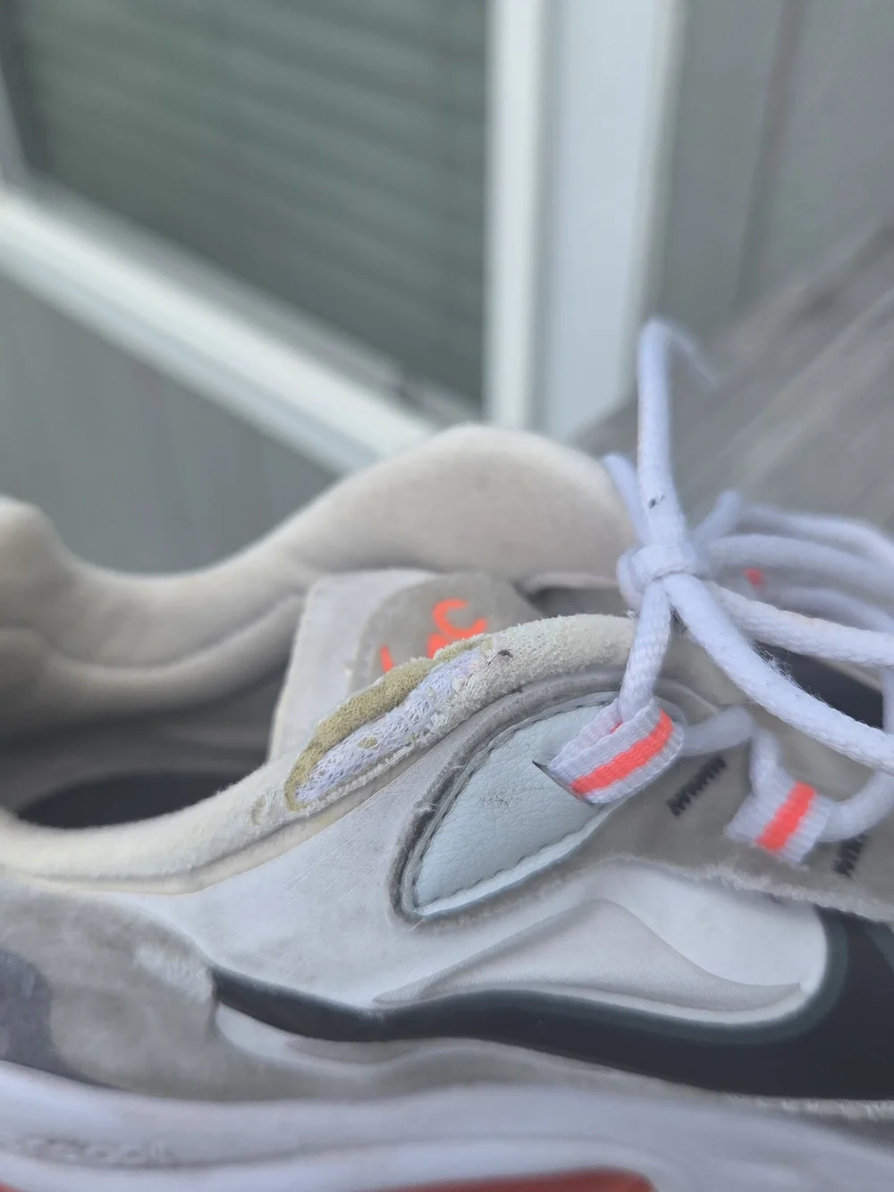 Nike White, Gray & Black Athletic Sneakers with Orange Air Accent